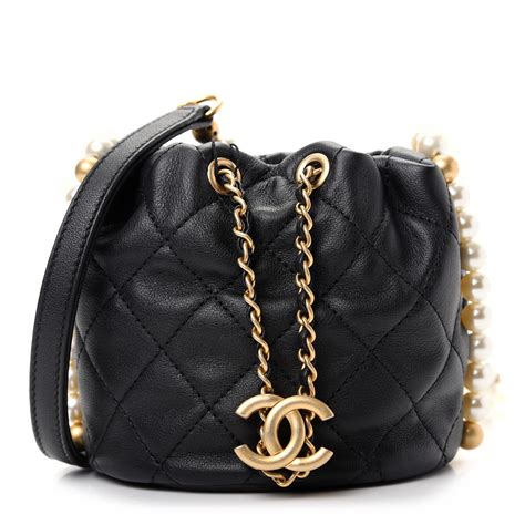 chanel bucket bag with pearls|Chanel bag with pearl chain.